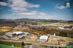 Obchodně - průmyslový areál staveb. a obch. spol., na pozemcích 19.599 m2, ul. T